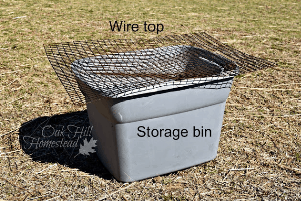 Storage bin with wire on top.