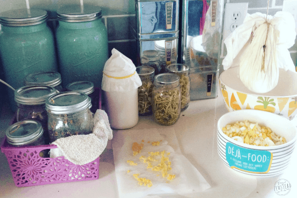 The Truth about Growing your own Food: Cheese, fermenting milk and jars of preserved food on the kitchen counter
