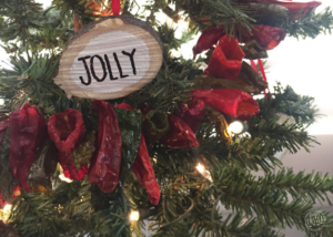 Christmas tree with pepper garland and wood slice ornament