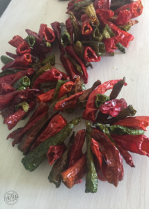 chili pepper garland lying on table
