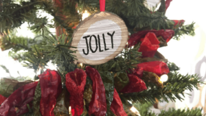 Christmas tree with "jolly" ornament