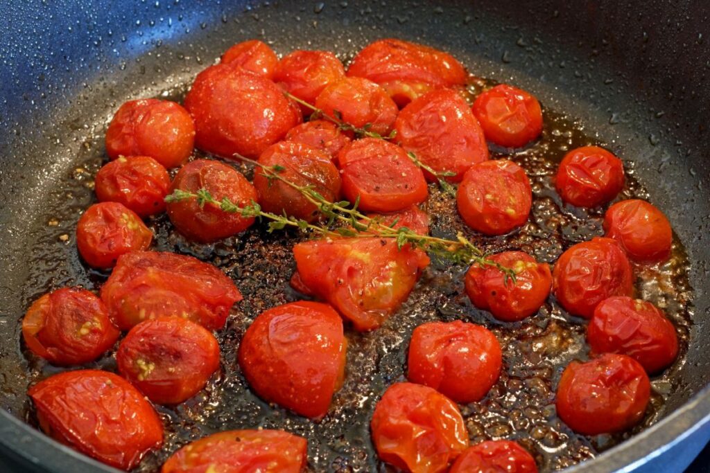Roasted and caramelized cherry tomatoes in a griddle
