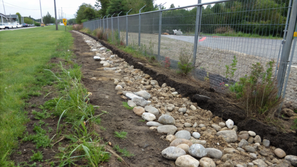 Rock Mulch Buffer Strip That Stops Mud and Weeds